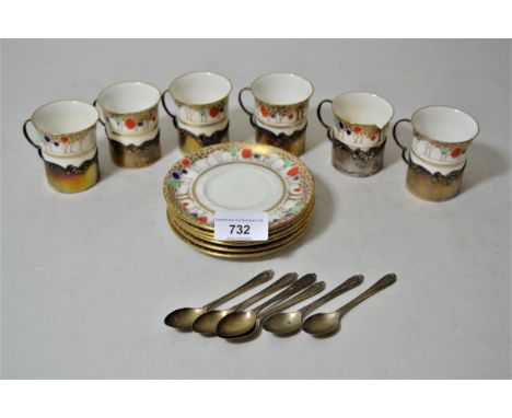 Set of six Shelley Art Deco coffee cans with saucers (some damages), each with a silver holder together with six silver coffe