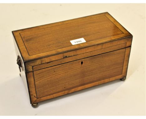 George III mahogany and satinwood crossbanded rectangular three division tea caddy with hinged cover and lion ring end handle