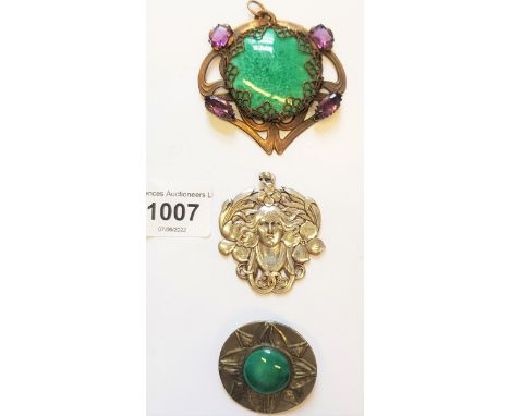 Art Nouveau brass porcelain mounted and amethyst pendant, Art Nouveau plated pendant and a brooch 