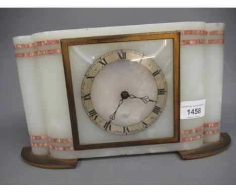 Art Deco white and red inlaid marble mantel clock by Elliott, having a silvered chapter ring with Roman numerals and gilt bra