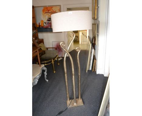 20th Century gilded metal standard lamp of stylised form, 57ins high 