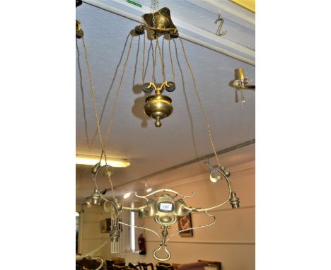 Pair of Arts and Crafts two branch rise and fall brass light fittingsBoth need rewiring, polishing and straightening.One is m