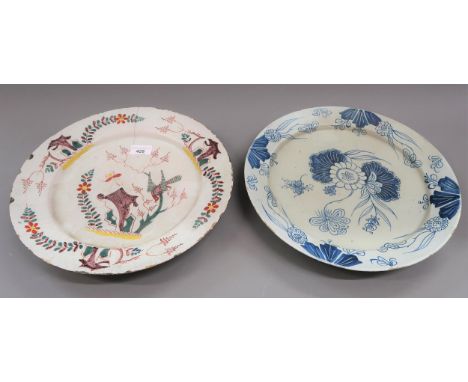18th Century polychrome Delftware plate decorated with a bird and foliage, 13.5ins diameter (at fault), together with a simil