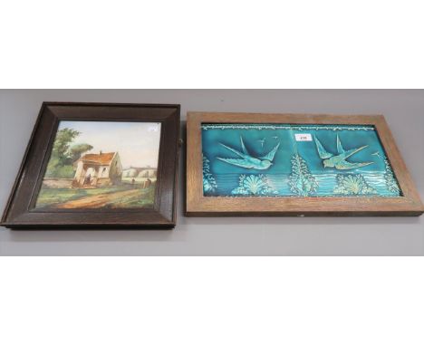 Pair of Victorian turquoise glazed pottery tiles decorated in relief with swallows, 8.25ins square, framed as a pair, togethe