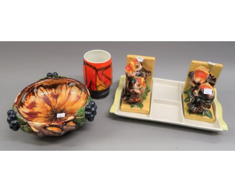 Pair of Austrian St. Peter Graz pottery bookends in the form of birds, Poole pottery vase, Poole pottery hors d'oeuvres dish,