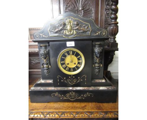 Large 19th Century black slate gilt metal mounted mantel clock, the black enamel dial with gilded Roman numerals and a two tr