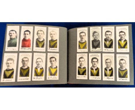 Cigarette & trade cards, a vintage photo album containing a selection of cards, all heavily laid down and mostly sport relate