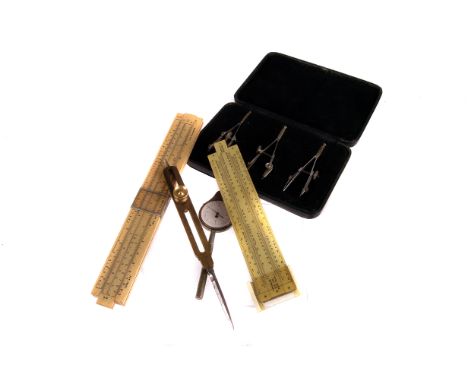 A WWI Gt Turnstile pair of mapping dividers, marked Stanley 1911, also marked with a WD and broad arrow, cased, together with