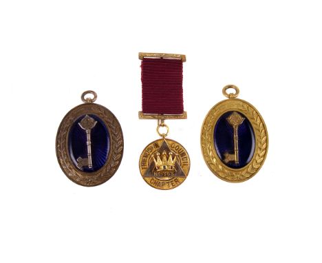 A silver and enamel oval pendant, awarded to Sir Theodore Chambers KBE, together with another gilt metal example, plus a 9ct 