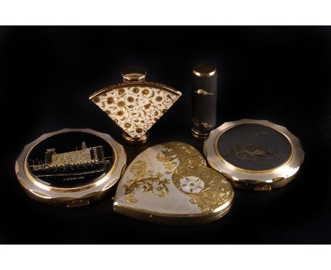 A group of five compacts and lipstick holders,  two with inlaid Japanese scenes, one marked from Singapore, a heart shaped co