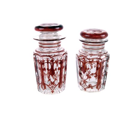 Two Bohemian style glass jars,   ruby flashed borders, and painted decoration, the larger 17cm high, together with two other 