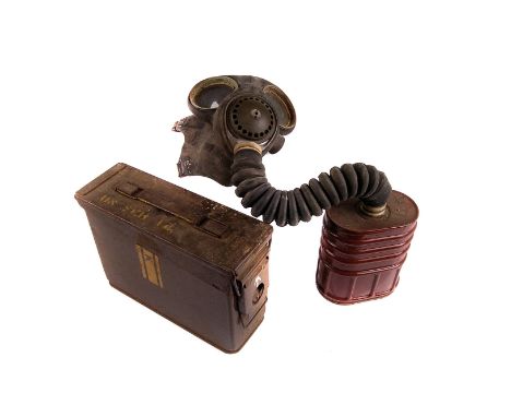 A selection of WWII items, including a 1941 MkII gas mask and carry case, plus another gas mask, together with a 1967 Mk1 amm