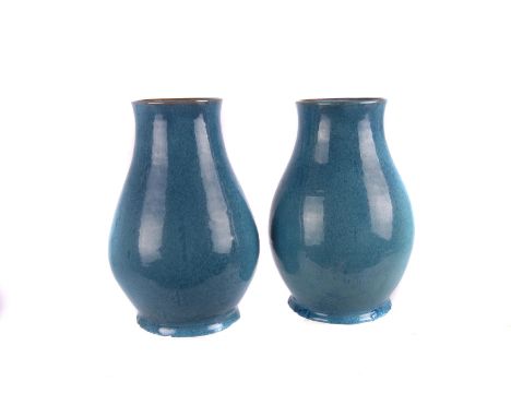 A pair of Carter, Stabler & Adams Poole Pottery Chinese blue glaze vases,  circa 1920, impressed mark to base, 25cm high, AF 