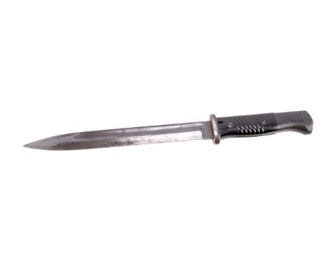 A WWII British bayonet, marked 2071 and S/172 to blade, blade approx 25cm, with metal scabbard and leather carry attachment (