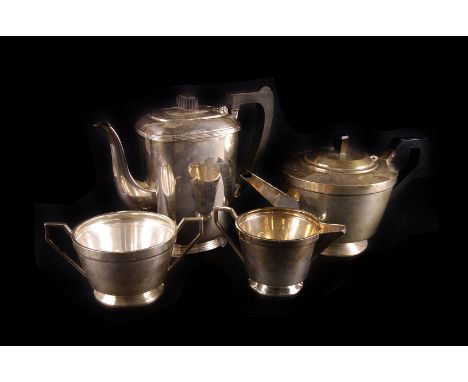 An Art Deco silver three piece tea service by Adams &amp; Holman, Birmingham 1946, of tapering cylindrical form the tea pot 2