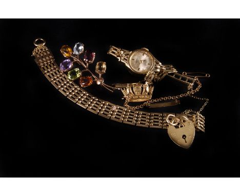 A group of 9ct gold jewellery,  to include a gate link bracelet, a lady's Rotary wristwatch, a multigem spray brooch, and a n