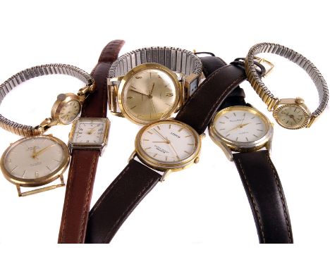 An assortment of gents and ladies wristwatches, including a 9ct gold Baume gents presentation watch, plus other makers includ