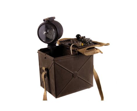 A WWI military signal lamp by J.L Ltd, comprising lamp, lamp pole and signal panel, unknown model, believe to be incomplete, 