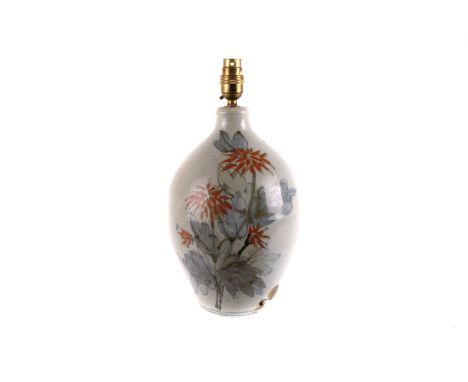 A studio ceramics stoneware lamp base,  with underglaze orange flower design, with fittings, 35cm high 