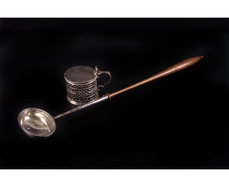 A George III silver mustard pot and toddy ladle, the mustard having pierced body and engraving to cover, the punch or toddy l