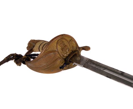 A British WWI Era Royal Naval Lieutenant Sword, by Gieve Matthews Seagrove Ltd, having lion's head pommel and white fish skin