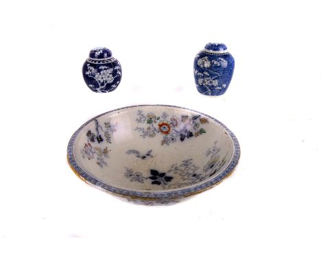 A matched pair of Chinese blue and white ginger jars,  with prunus decoration overall, the taller 14cm high, together with a 