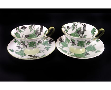 A Shelley 'Chippendale' pattern part tea service, of green and black rose design, 22 pieces
8 matched saucers (one saucer bro