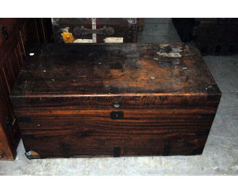 A Victorian cedar trunk, with brass applied mounts and handles 