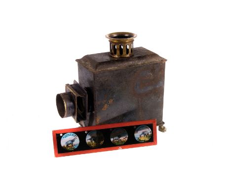 A late 19th century German Magic Lantern,  in original fitted box with cover label, complete with story series glass slides 