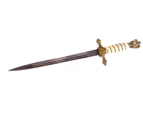 A WWII Herman Kreigsmarine dagger, having eagle pommel with target to front, eagle and cross rifles to cross guard, marked E&