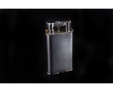 A 1930s chrome plated Dunhill lighter,  9cm high 