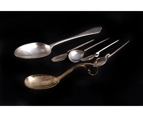 An early 20th century silver caddy spoon by George Jensen,  circa 1910-25, import marked, together with two sets of six moder