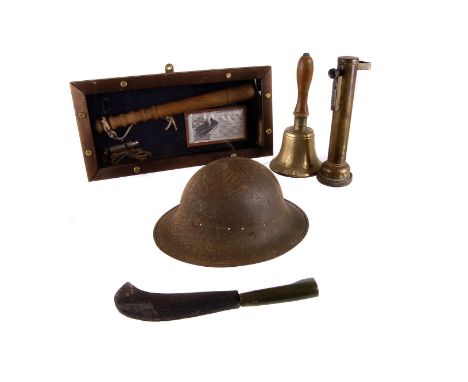 A selection of various items, to include an Air Raid Warden style helmet, an ARP hand bell, a Santon Limited Signal Torch, an