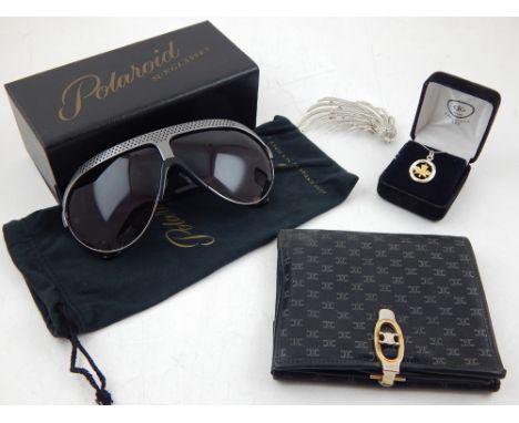A pair of vintage Polaroid sunglasses, with presentation box and soft bag, together with a pair of Gucci sunglasses, a purse,