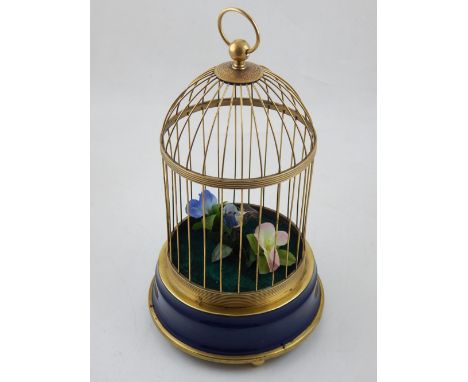 A Victorian singing bird automaton in gilt metal cage, H. 30cm.
