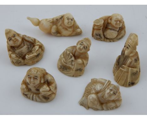 A collection of seven late 19th century Japanese Meiji period ivory netsuke Immortals. (7)