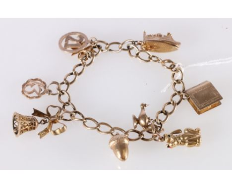 9ct gold curb link charm bracelet with nine dependant charms including Aladdin's Lamp, Bible, Acorn, Ship etc., most stamped 
