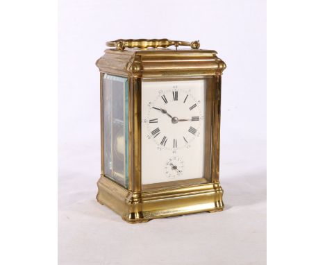 19th century repeater carriage clock in brass case, the enamel dial with Roman numerals and subsidiary dial with Arabic numer