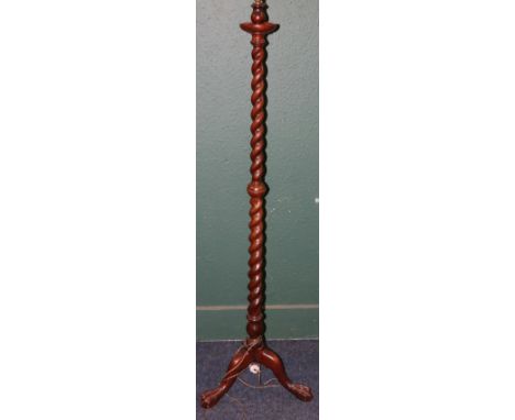 19th century mahogany standard lamp raised on barely twist column and ball and claw feet, 155cm tall 
