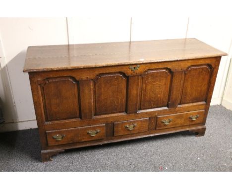 Antique oak mule chest with rectangular hinged top and three base drawers raised on bracket feet, 165cm long 