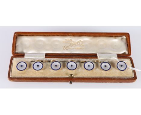 Set of seven 9ct gold, sapphire, mother of pearl and blue enamel buttons, each stamped 9c, 9.56g gross, in fitted box for Rob