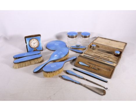 Art Deco silver and guilloche enamel dressing table set comprising hand mirror, brushes, etui in Asprey of London of fitted c