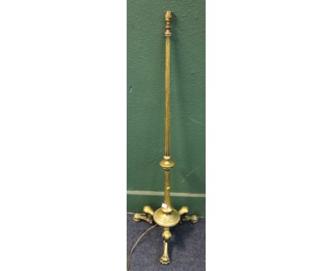 Brass standard lamp raised on three paw feet by Faraday and Sons 