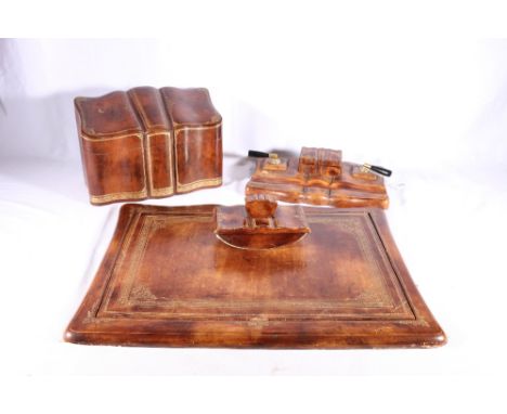 Asprey of London tooled gilt leather desk set comprising desk stand, blotter, stationary box and slab, (4) Condition Report:D