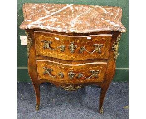French bombe shaped commode with marble top, serpentine front with ormolu mounts and sabots raised on cabriole supports, 72cm