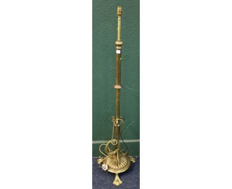 Brass and copper adjustable telescopic standard lamp raised on gadrooned base 