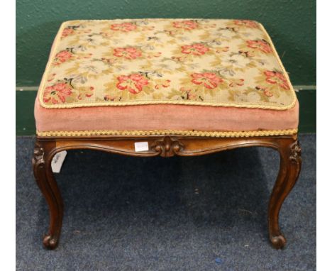 19th century mahogany stool upholstered in floral patterned tapestry raised on french cabriole legs terminating in whorl feet