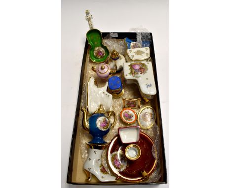 A collection of small Limoges items including chamber stick, trinket boxes etc
