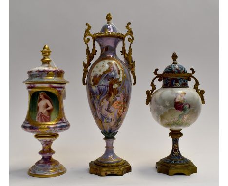 Paris porcelain urn and cover with Art Nouveau gilt decoration on fairy lustre ground together with another similar one in gi