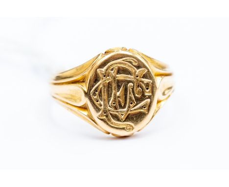 An 18ct gold monogrammed seal ring, size O, total gross weight approx. 9.9gms